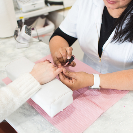 woman painting nails