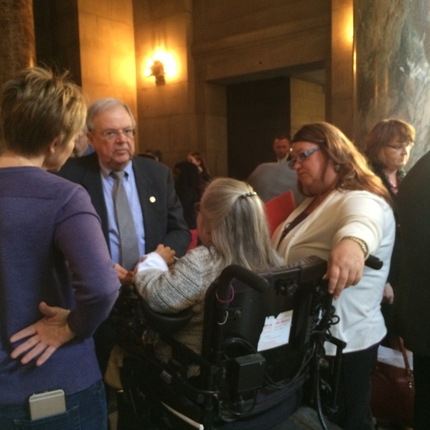 Folks talking with state senator at capitol