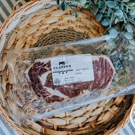 A pack of steak sitting in a basket 