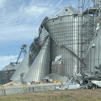 Wind damaged grain bins