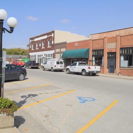 Cars parked outside Main Street businesses