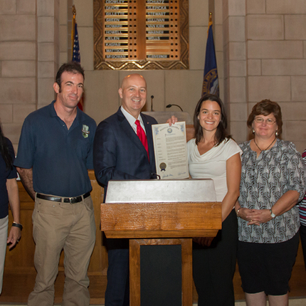 Group of people with the governor and proclamation