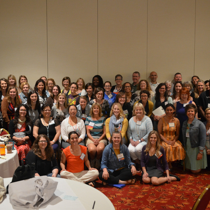 Group photo of people at a conference