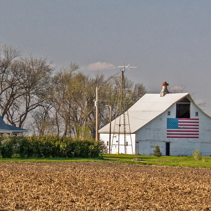 Barn with flag on it