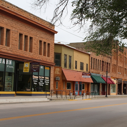 main street in South Dakota, buildings and cars driving