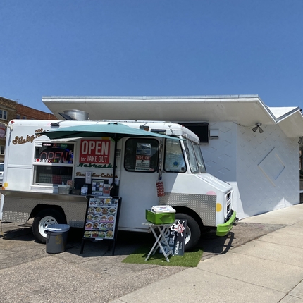 food truck in front of building