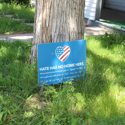 Sign in yard that says Hate Has No Home Here