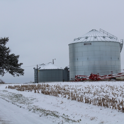 Grain bins with snow