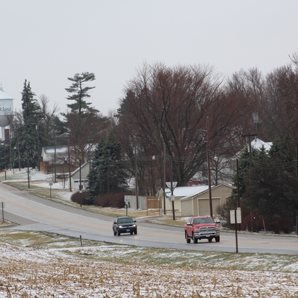 Highway coming out of Oakland, Nebraska, some snow on the ground