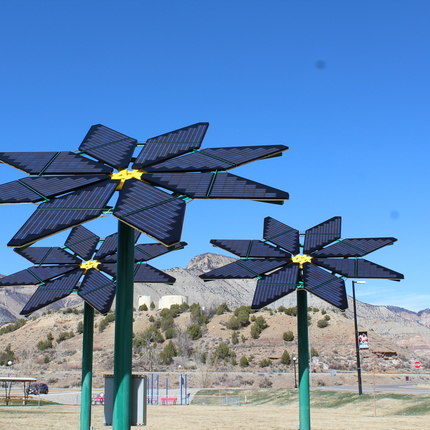 Solar panels in the shape of sunflowers. Panels that power a Colorado community