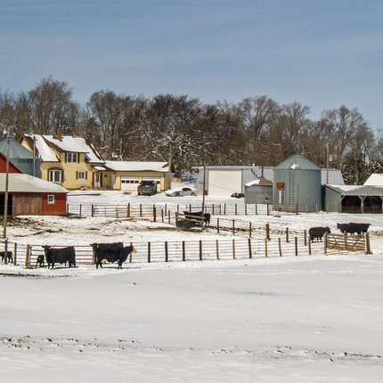 Rural home with snow