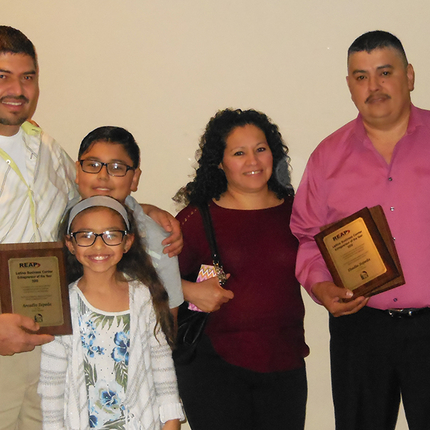 Family with award