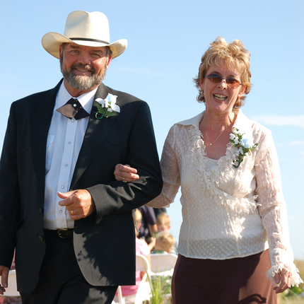 Man and woman with arms linked