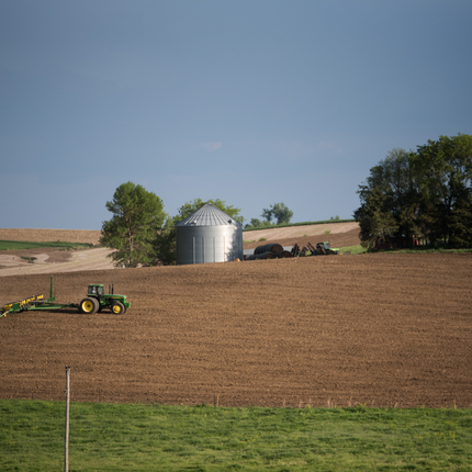 Tractor planting crops