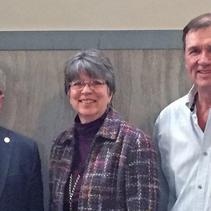 Two men and a woman at the Nebraska Legislature
