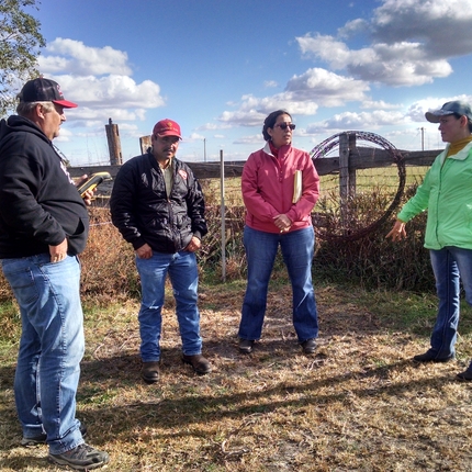 Group of people standing in a field