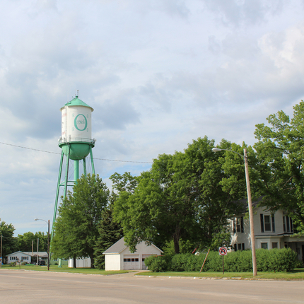 community water tower and house