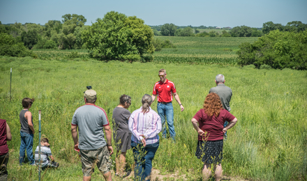 Man leading farm tour