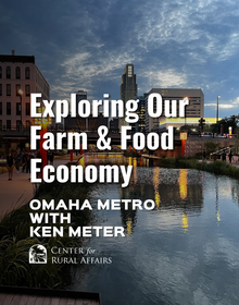 A photo of the waterfront space at Gene Leahy Mall in Omaha with the words "Exploring Our Farm & Food Economy Omaha Metro with Ken Meter"